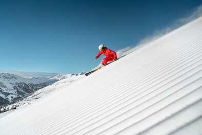 Skifahrer auf der Piste in Saalbach Hinterglemm | © Christoph Johann